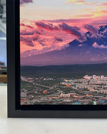 A canvas print at Artbeat Studios in a black float frame.