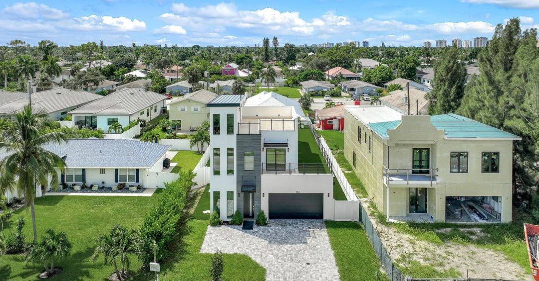 Modern home exterior with a white and gray color scheme
