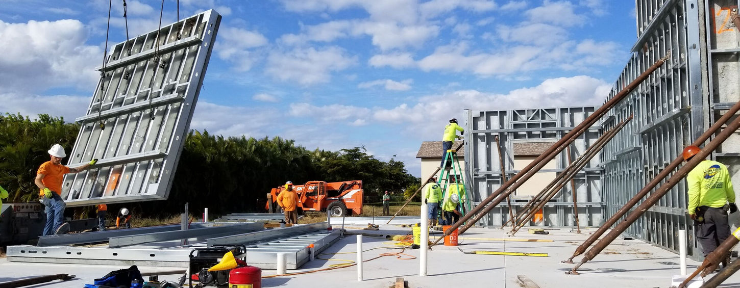 Construction site with workers and crane
