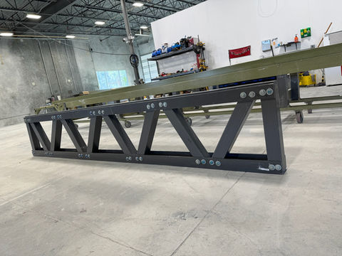 Steel beam structure in a workshop.