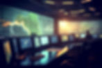 Operator monitoring global network activity on multiple screens