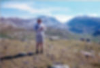 My dad near our base camp in Cloud Peak Wilderness, roughly 11,000 feet and 6+ miles from the trailhead with Cloud Peak in the background, 1999
