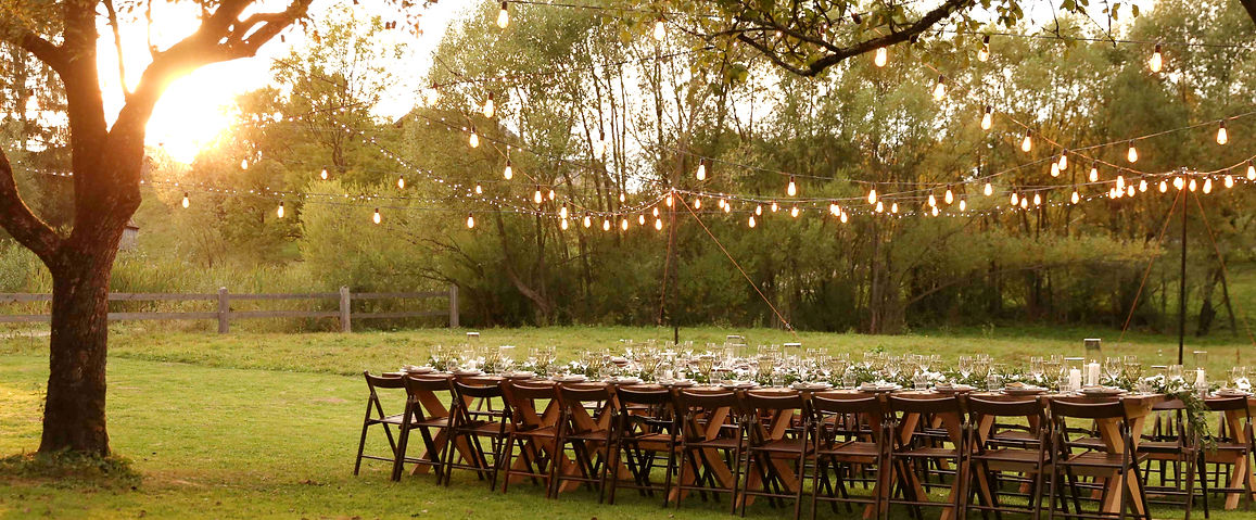 Outdoor dining table beautifully set for a shared meal, reflecting hospitality, faith and intentional living.