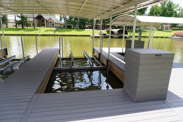 Custom boat dock built by G&C Bulkhead Construction on Lake Conroe waterfront