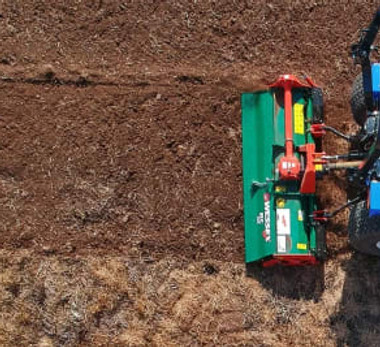 tractor rotavating.jpeg