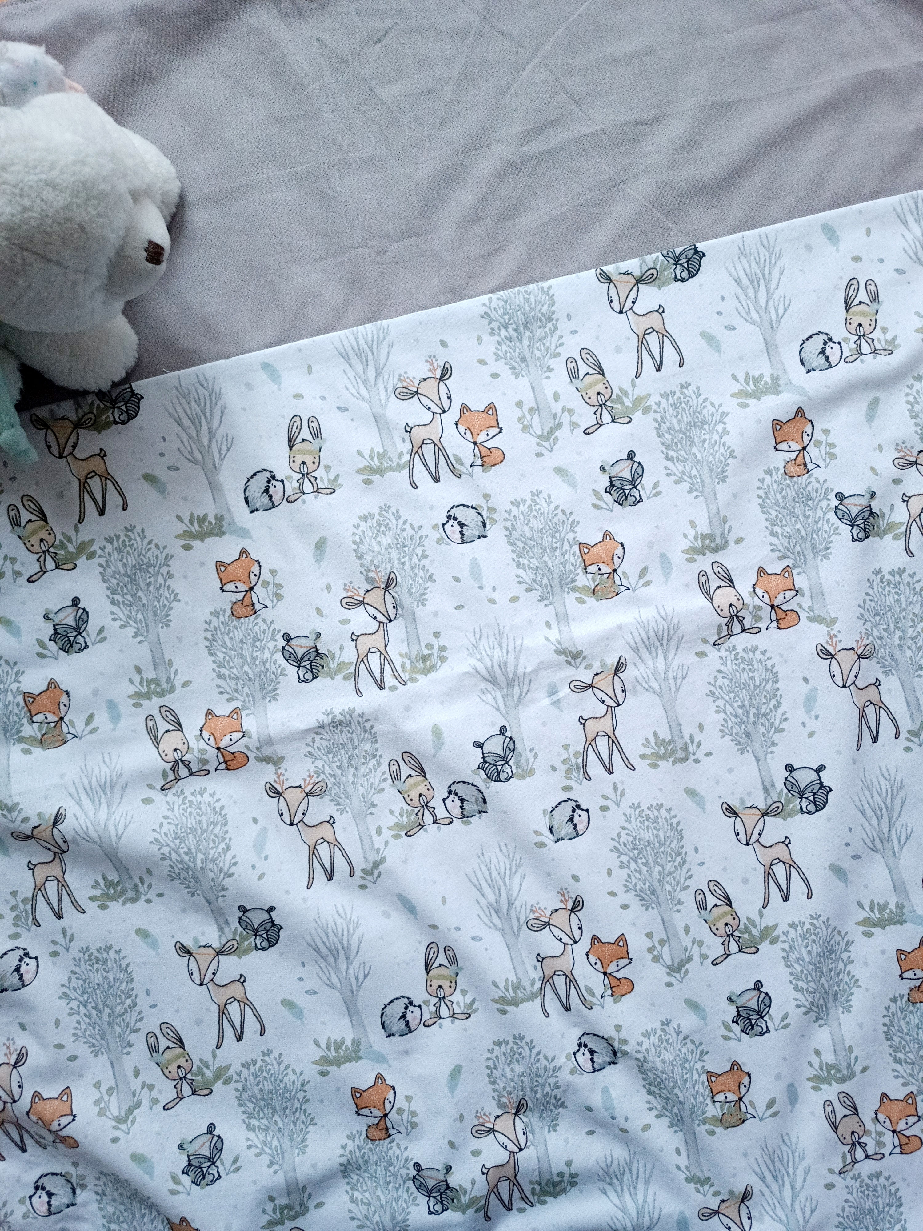 La couverture mi-saison personnalisée "Cerfs et arbres"