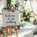 wedding-ceremony-welcome-sign-with-floral-decorations.jpg