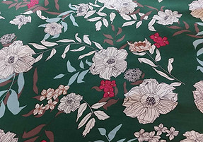Brown viscose fabric decorated with light blue floral bouquets