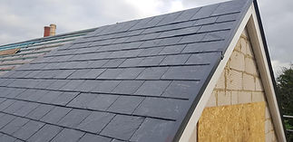 Slate roof installation with ridge detailing
