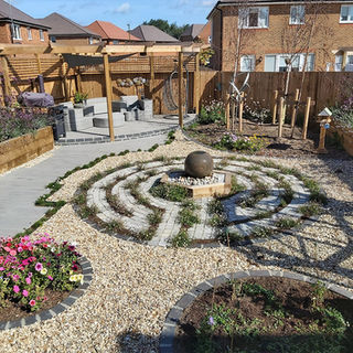 Modern garden with a circular stone path