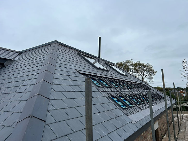 Slate re roofing project on coastal property