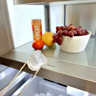 Modern kitchen sink with fruit bowl on marble worktop
