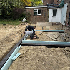 Foundation trenches and site prep for a large extension