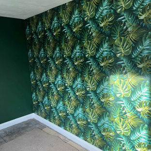 Green wallpaper in a living room