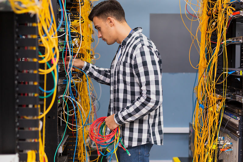 young-network-engineer-with-ethernet-wires-medium-shot.jpg