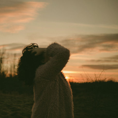 woman stressed out with hands on her head