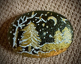 Hand-painted heart-shaped stone with branches, leaves, a winter scene,  and the words “You are allowed to take up space"