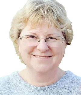 This is a photo of Laurie Bouck who is the artist behind Laurie Bouck Art. She is smiling and has short gray hair and wears glasses.
