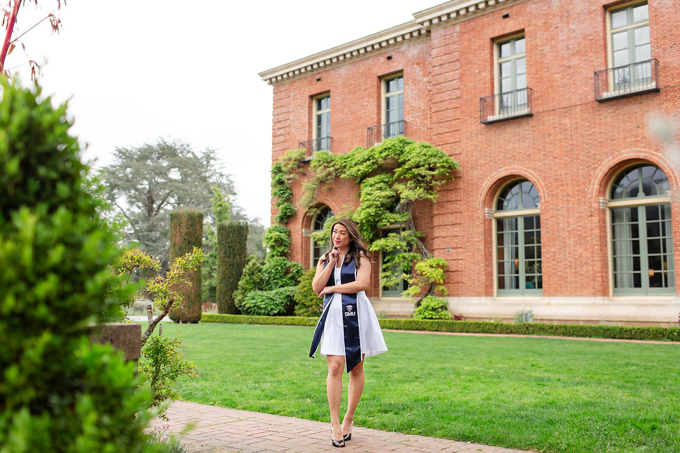 Woman in an SMU graduation dress posing on a lawn beside a red-brick mansion covered in vines.
Samuel Merritt University Spring Grad Photoshoot by HKCreate Bay Area Photographers 
Filoli Historic House and Garden, Woodside 