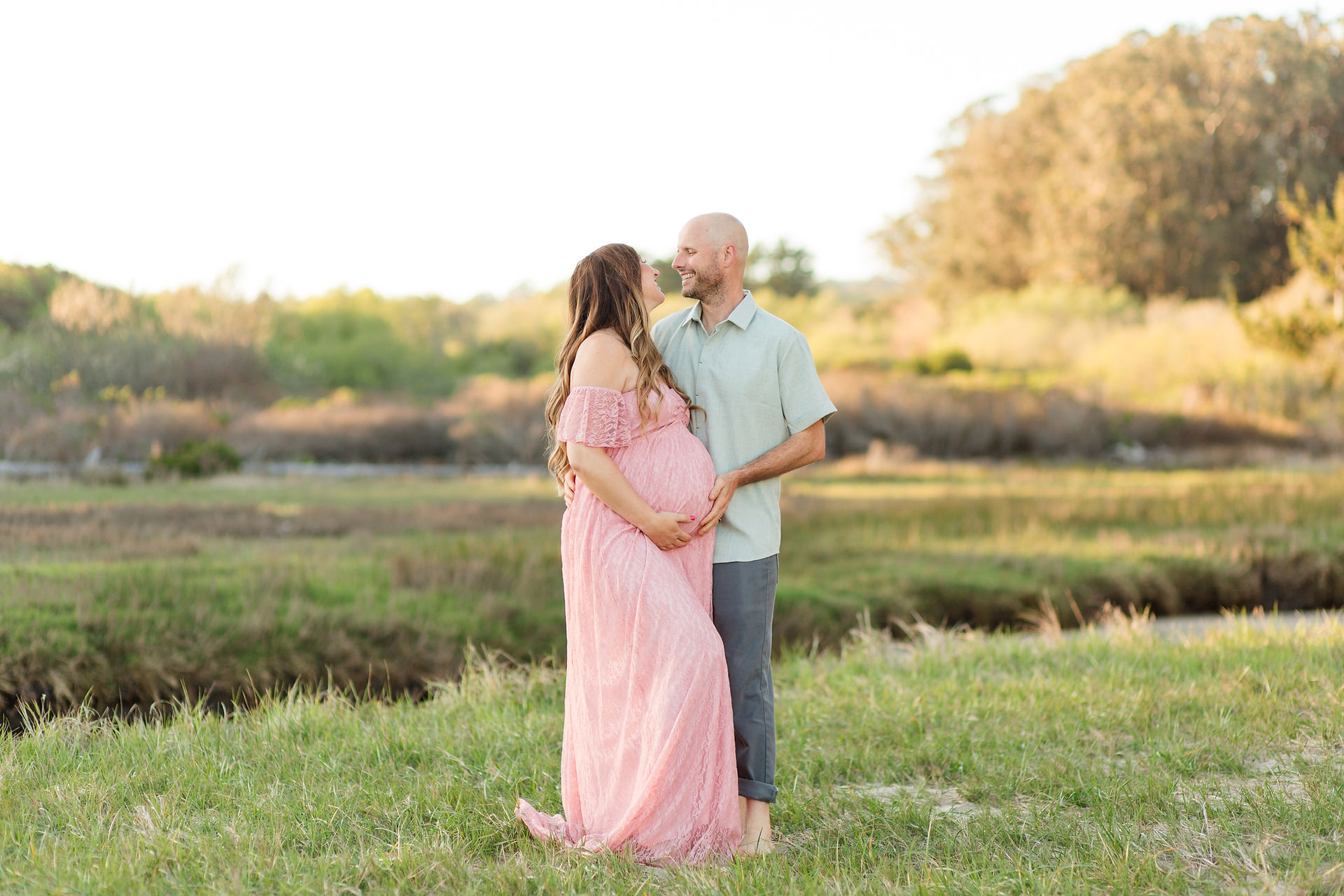 hkcreate bay area photography joyful light and airy san jose photographers northern california photoshoot beach maternity session pink lace dress natural bridges state beach santa cruz flower crown grass couple pose idea