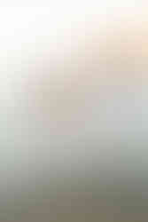 Husband and wife walking on the beach next to the ocean holding hands. Warm and joyful atmosphere. Rockaway Beach Pacifica Fun Playful and Cute Family Photoshoot by HKCreate Bay Area Photographers.