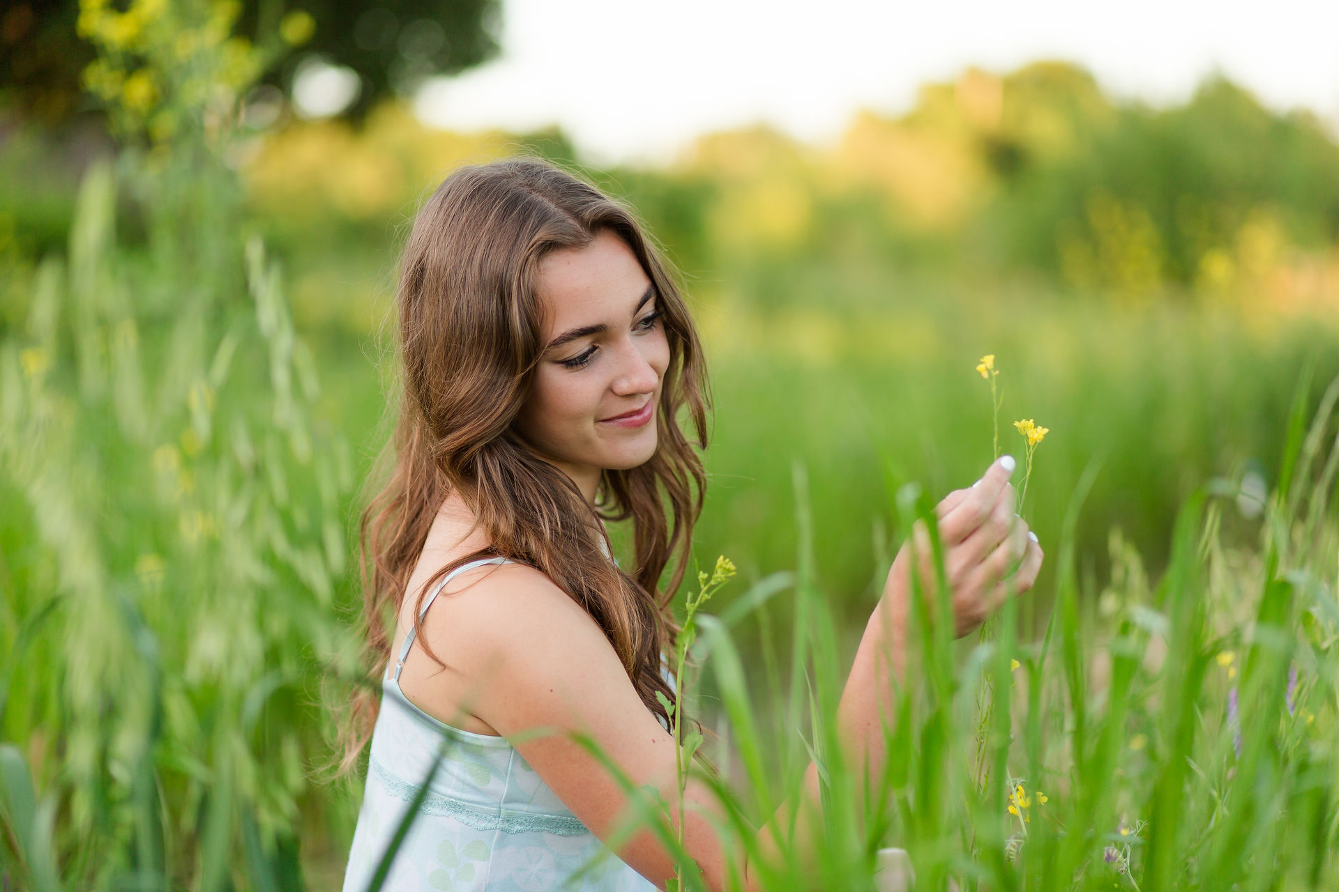 hkcreate bay area photography san jose photographers heritage orchard saratoga library saratoga northern california high school spring graduation session young girl portraits in an orchard and field with flowers beautiful and joyful light and airy