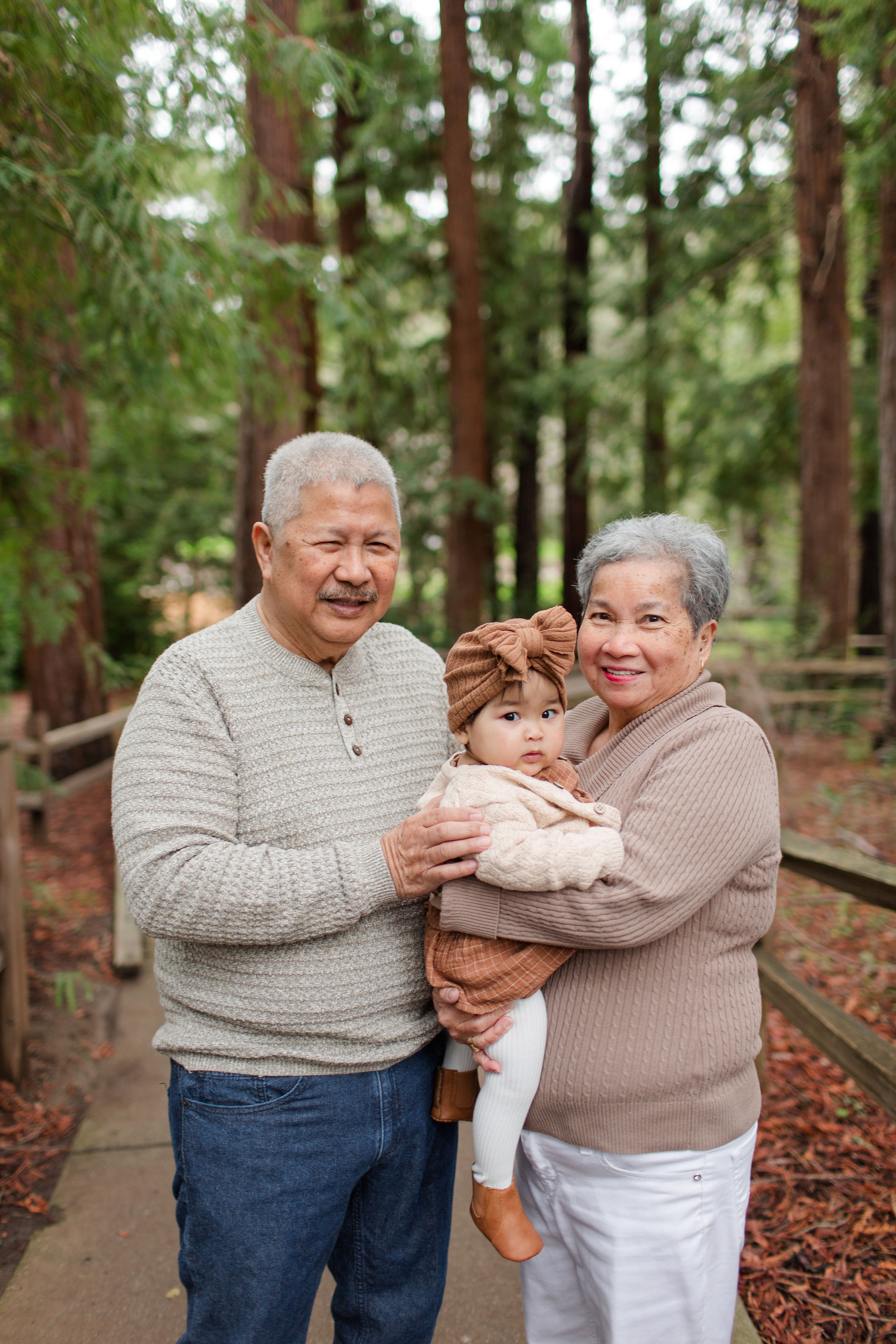 hkcreate bay area photography joyful light and airy san jose photographers northern california photoshoot legacy extended family neutral outfit ideas sweaters winter forest redwood grove nature preserve los altos grandparents fun playful laughing