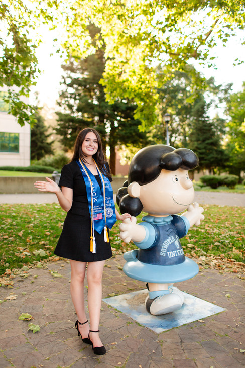 College Grad photoshoot at Sonoma State University  by Bay Area Photographers HKCreate. Graduation next to Lucy statue 