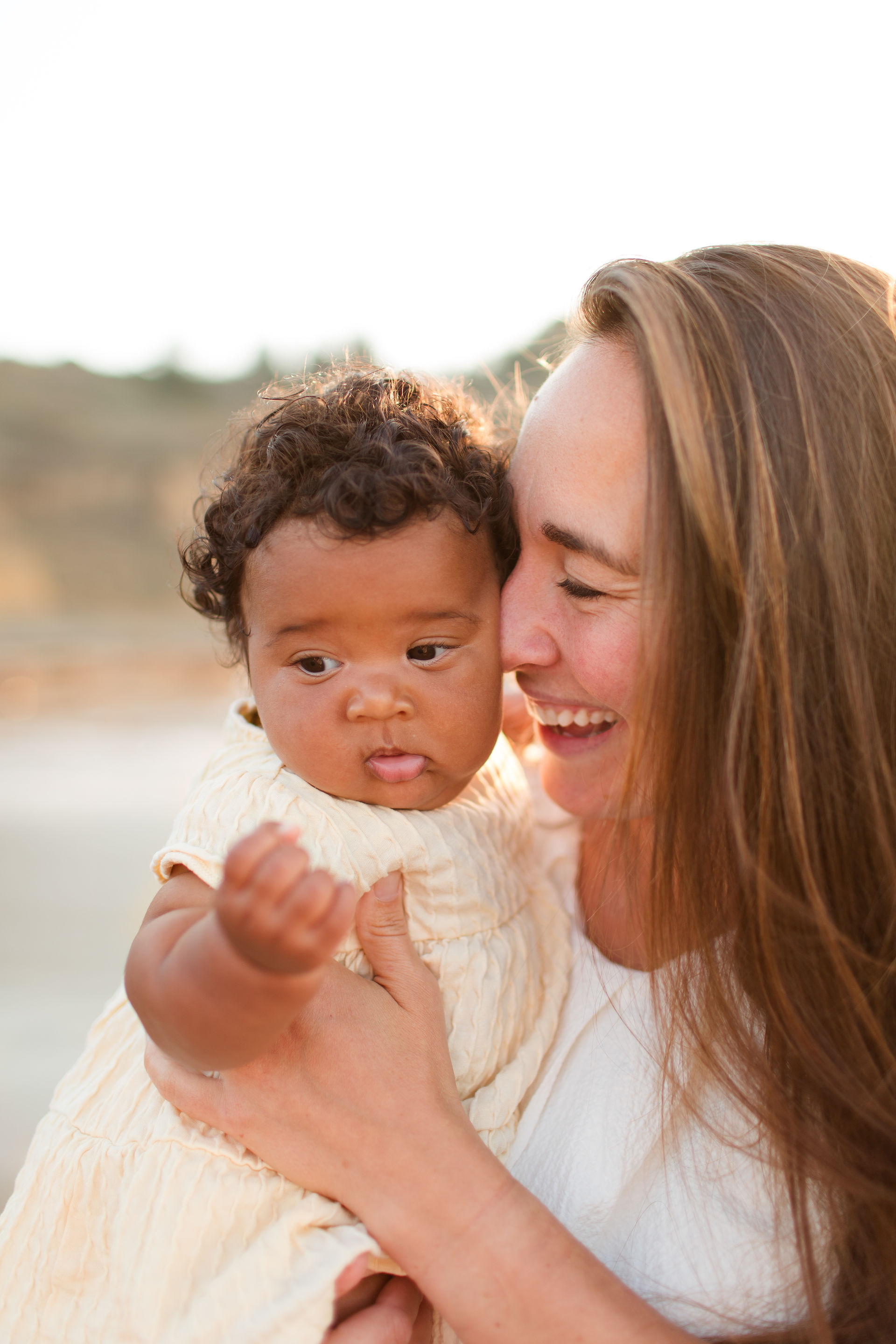 hk create photography beach photoshoot mother daughter chunky baby girl yellow dress laughing rockaway beach pacifica