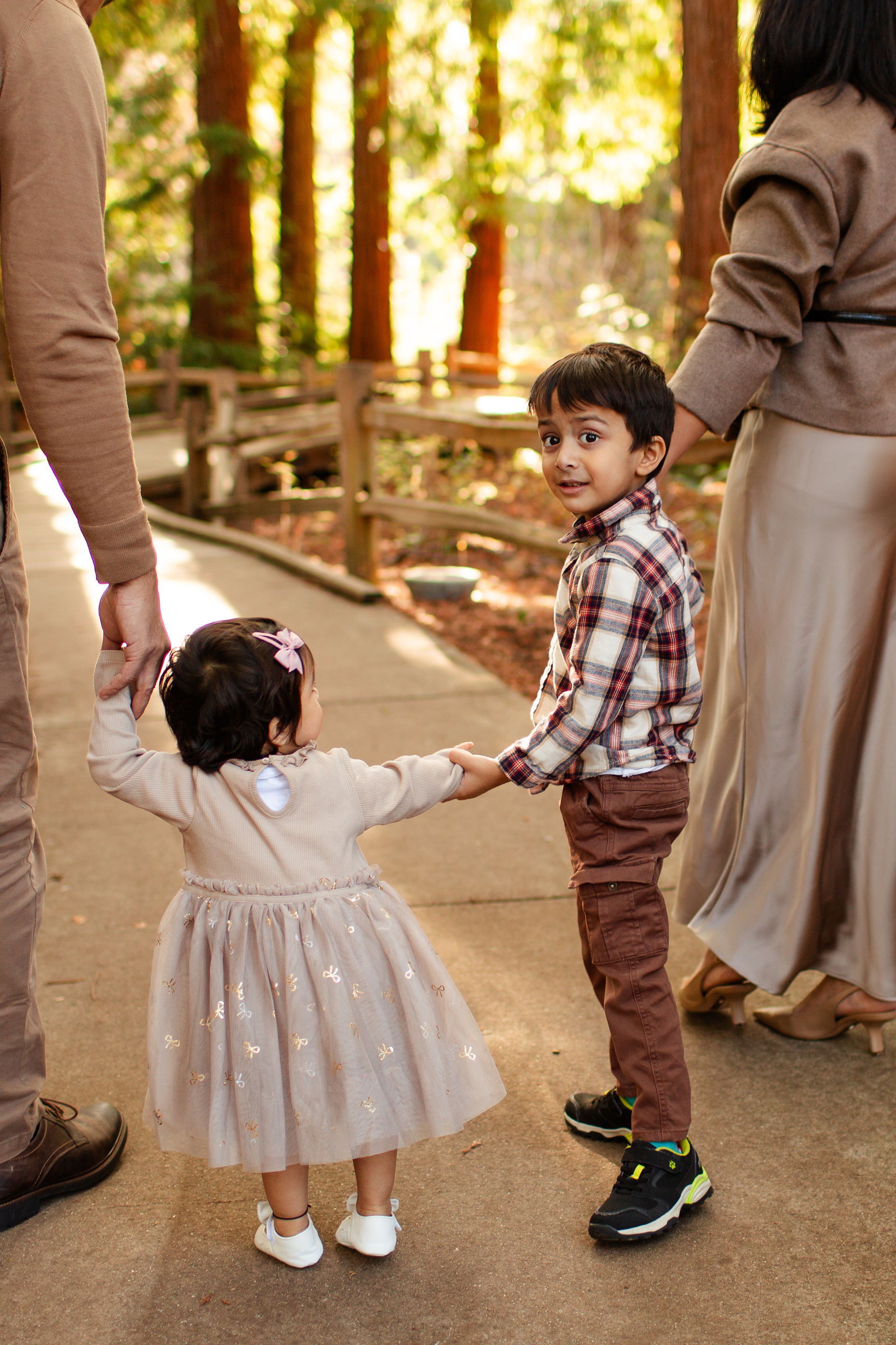 hkcreate bay area photography joyful candid light and airy san jose photographers northern california photoshoot bay are family photographers redwood grove nature preserve los altos family of four neutral tan color scheme outfits cute little boy and girl cute and happy