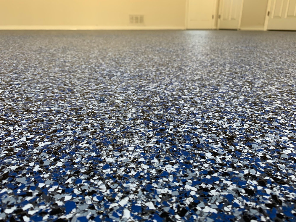 What a difference a great epoxy coating makes in an old dirty garage floor.