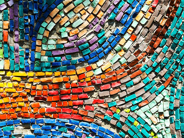 Detail of beautiful old collapsing abstract ceramic mosaic adorned building. Venetian mosa