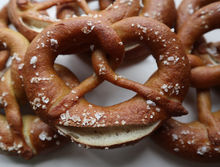 Golden baked sourdough pretzels, sprinkled with sea salt..
