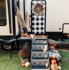 latch.it rv keyless entry door lock installed on rv door. RV during halloween with dog
