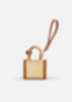 Handwoven Portuguese micro basket bag in natural reed with genuine leather details. The Heiress Pure Edition is a minimalist