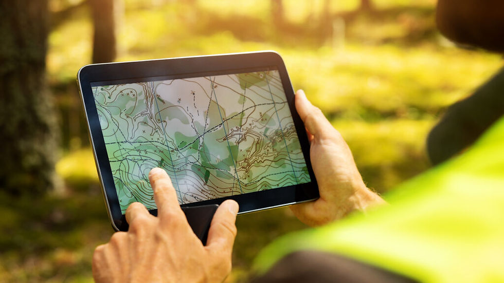 Close-up view of mining engineer analyzing geological data on a digital tablet