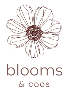 Logo showing flower and the words blooms and coos