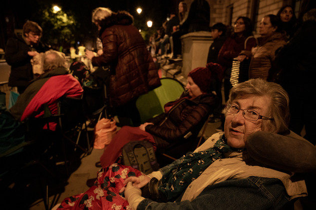 18th September 2022 | Families positioned to have the first row and spend the night before the Queen's funeral, Parliament Square.