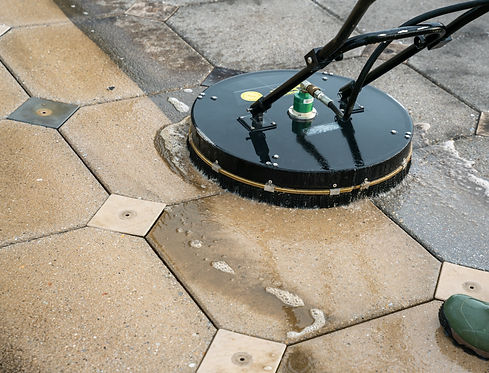 Dramatic close up Pressure Washing Driveway Surface Cleaning
