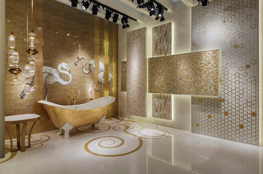 A luxury bathroom accented with gold furnishing