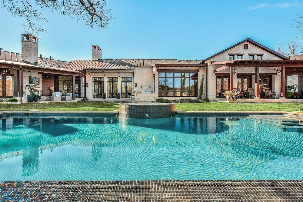 house with pool in front yard