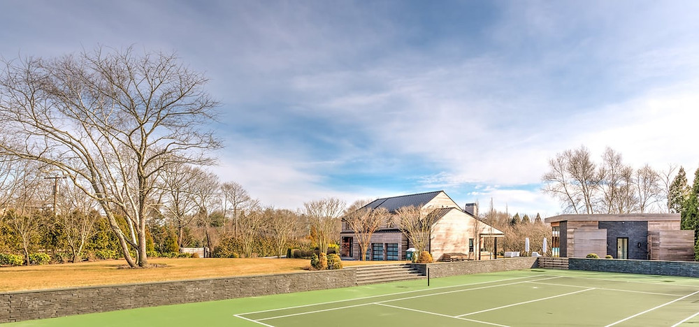 house with tennis court