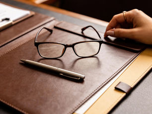 Estate planning documents on a desk representing a comprehensive estate plan review