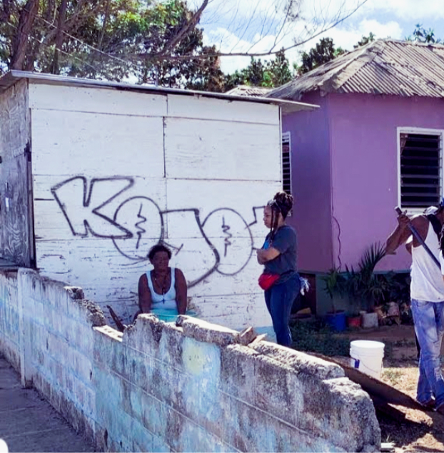 A picture of me having a heart to heart with a lady from the community I served in Jamaica with my church.