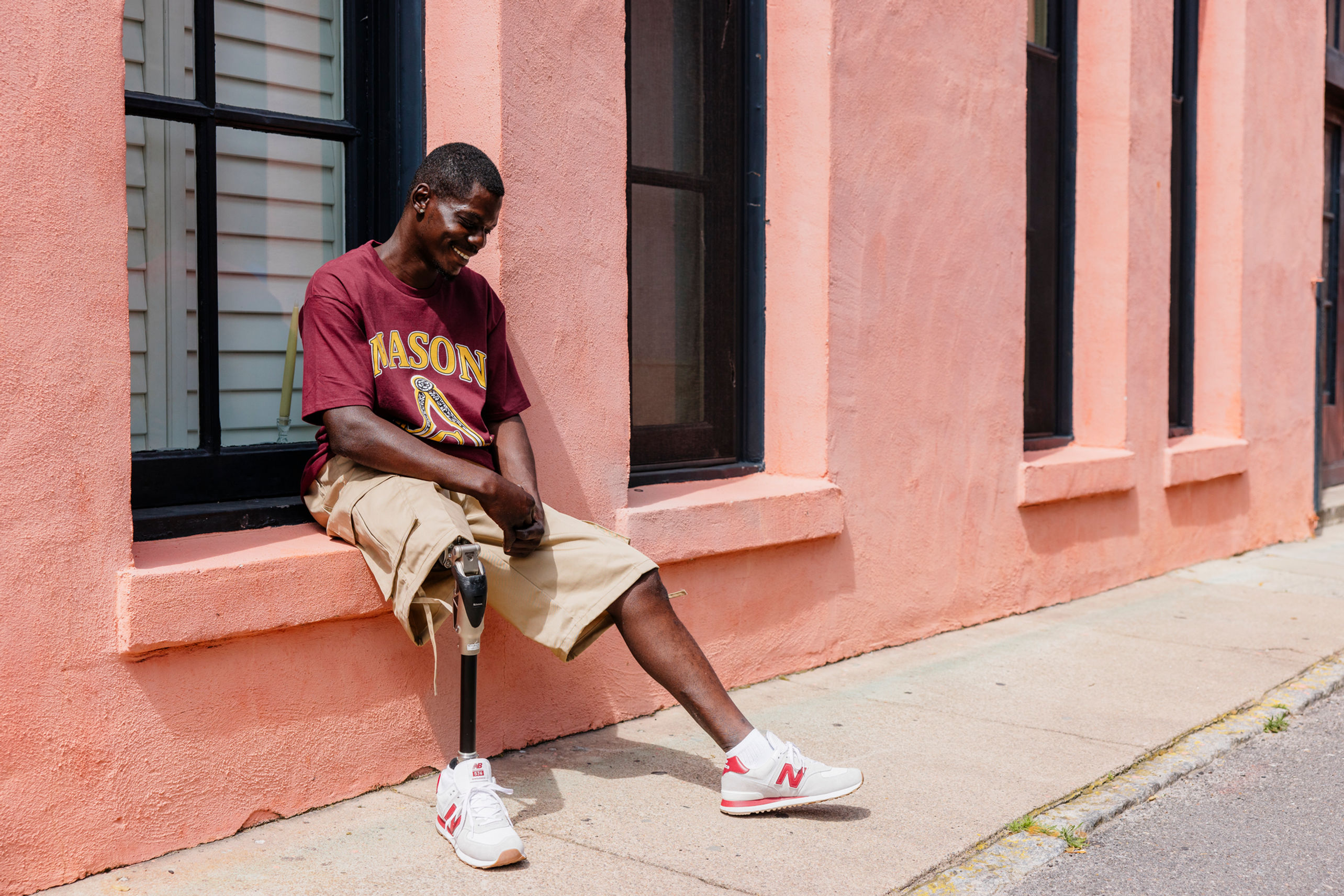 Patrick on Pink House Smiling Low Res.jpg