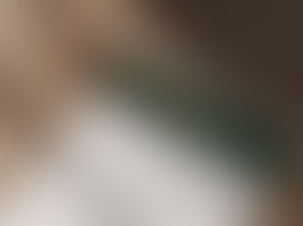 A letterhead on a wooden table with a pencil. It has a green header with text "Moture Apparel & Lifestyle Pvt. Ltd." and contact info.