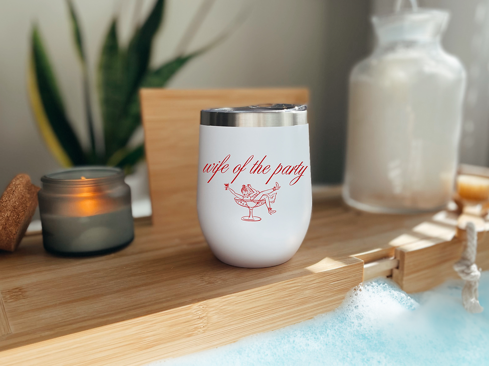 White tumbler with 'wife of the party' text and cocktail illustration