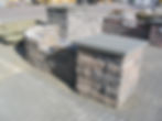 Highland freestanding retaining wall display in Rawhide color with concrete pillars and caps.