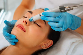delighted-nice-positive-woman-having-hydrafacial-procedure-picture