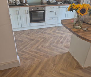 parquet flooring from Totally wood in a customers kitchen completed in 2025